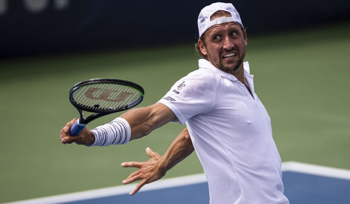 Sandgren hit in groin, defaults after striking line judge with ball